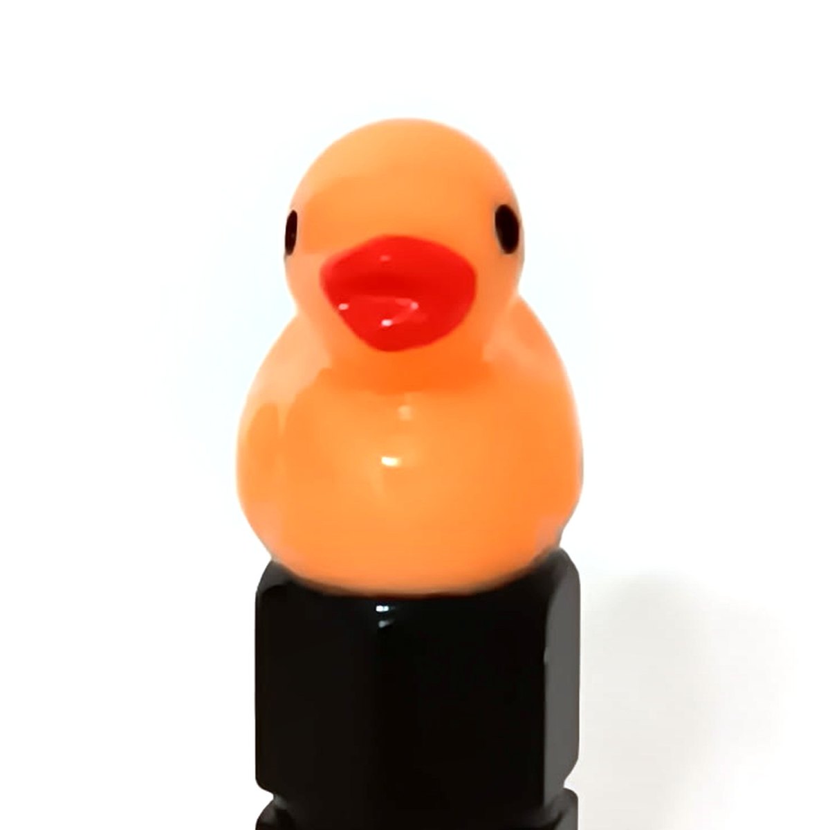 Orange duck valve stem cap