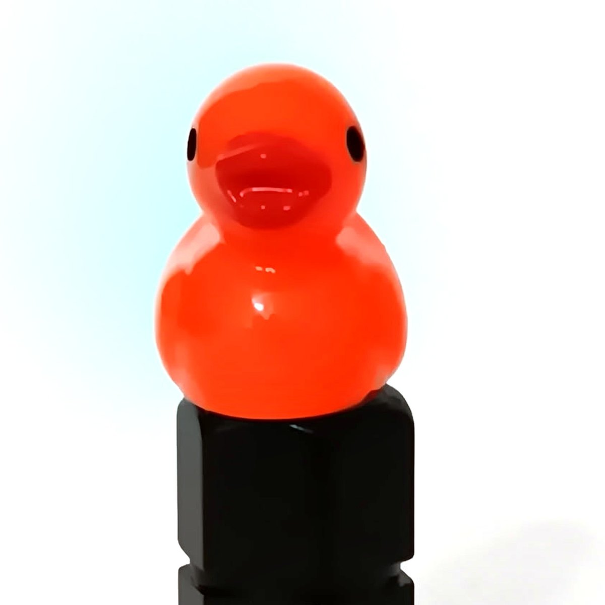 Deep orange duck valve stem cap