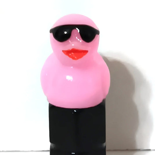 Light pink duck valve stem cap wearing tiny sunglasses