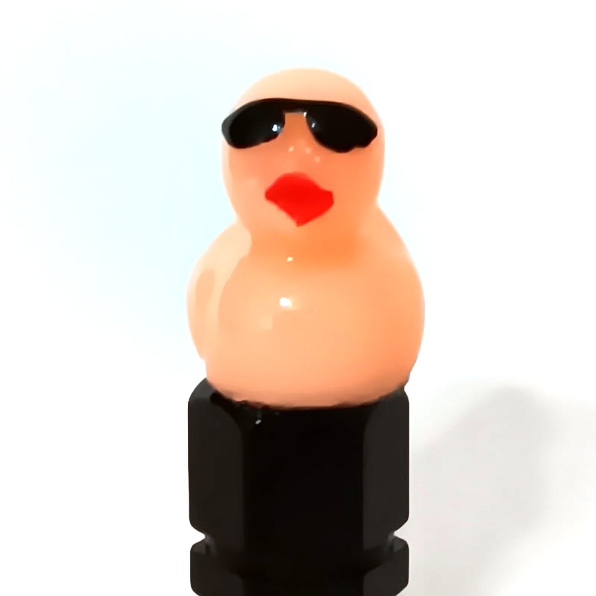 Peach duck valve stem cap wearing tiny sunglasses