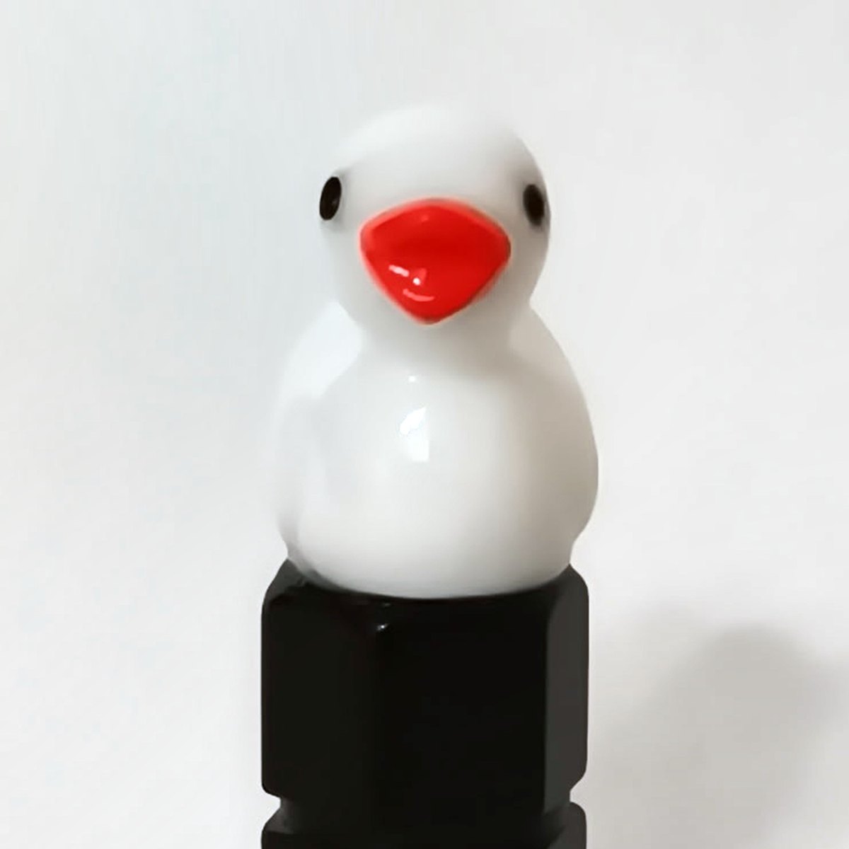White duck valve stem cap